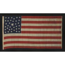 35 STARS, PROBABLY A CIVIL WAR CAMP COLORS, WEST VIRGINIA STATEHOOD, 1863-1865, ONE OF A TINY HANDFUL OF PRESS-DYED WOOL FLAGS WITH A RANDOM CONFIGURATION OF STARS