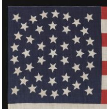 44 STARS ON A LARGE SCALE PARADE FLAG, WYOMING STATEHOOD, 1890-1896, RARE IN THIS PERIOD WITH A WREATH CONFIGURATION