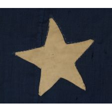 13 STARS IN A VARIATION OF A VERY RARE CONFIGURATION CALLED THE "TRUMBULL PATTERN", NAMED BECAUSE OF THE USE OF FLAGS IN THIS BASIC DESIGN-A SQUARE OF STARS SURROUNDING A SINGLE CENTER STAR-IN THREE OF JOHN TRUMBULL'S 18TH CENTURY PAINTINGS OF HIS COMMANDER, GEORGE WASHINGTON, ca 1830-1850's