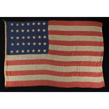 35 HAND-SEWN, SINGLE-APPLIQUÉD STARS ON AN CIVIL WAR PERIOD FLAG WITH HAND-SEWN STRIPES, 1863-1865, WEST VIRGINIA STATEHOOD