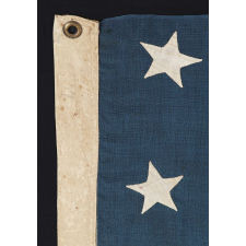 13 HAND-SEWN STARS ON A U.S. NAVY SMALL BOAT ENSIGN OF THE 1876 CENTENNIAL ERA