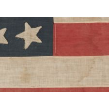 45 STARS IN A "NOTCHED" DESIGN ON A SMALL SCALE FLAG OF THE 1896-1907 PERIOD, LEAVING SPACE OPEN FOR THE FUTURE ADDITION OF THREE MORE WESTERN TERRITORIES, OWNED AND POSSIBLY MADE BY ALVAH WOODBURY, A SHOEMAKER, OF BEVERLY MASSACHUSETTS