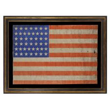 44 STARS IN JUSTIFIED ROWS ON A LARGE SCALE PARADE FLAG WITH STRIKING COLORS AND PLEASANT WEAR, WYOMING STATEHOOD, 1890-1896