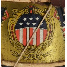 PATRIOTIC TOY DRUM WITH OVAL SHIELDS AND AMERICAN FLAGS, SIGNED "CONVERSE," WINCHENDON, MASSACHUSETTS, CA 1890-1900