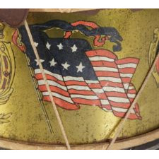 PATRIOTIC TOY DRUM WITH OVAL SHIELDS AND AMERICAN FLAGS, SIGNED "CONVERSE," WINCHENDON, MASSACHUSETTS, CA 1890-1900