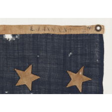 U.S. NAVY JACK WITH 37 STARS, AN ENTIRELY HAND-SEWN EXAMPLE WITH SINGLE-APPLIQUÉD STARS, MADE BY ANNIN IN NEW YORK CITY BETWEEN 1867 AND 1876, RECONSTRUCTION ERA, NEBRASKA STATEHOOD