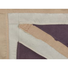 PAIR OF LIBERATION FLAGS, MADE IN FRANCE TO CELEBRATE THE ARRIVAL OF U.S. AND BRITISH TROOPS FOLLOWING LIBERATION FROM THE NAZIS DURING WWII, NOTE THE STAR OF DAVID-SHAPED PROFILES ON THE AMERICAN EXAMPLE AND THE USE OF THE SAME CANDY-STRIPED FABRIC IN BOTH FLAGS, CA 1944