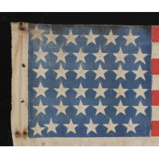 CIVIL WAR ERA PARADE FLAG WITH 36 STARS IN A VERY RARE FORM THAT DISPLAYS A “U” FOR UNION