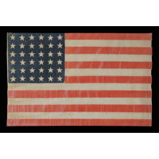 36 STAR ANTIQUE AMERICAN PARADE FLAG OF THE CIVIL WAR ERA, IN AN ESPECIALLY LARGE SCALE AND WITH BOLD COLOR, 1864-67, NEVADA STATEHOOD: