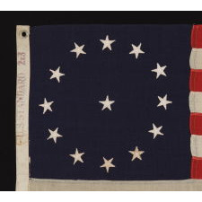 13 STARS IN A CIRCULAR VERSION OF THE 3RD MARYLAND PATTERN, ON A SMALL SCALE FLAG MADE IN THE 1890-1920’s ERA: