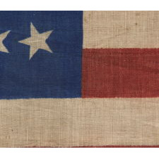 34 STARS, CIVIL WAR PERIOD, PRINTED ON A WOOL BLENDED FABRIC, RARE NOTCHED DESIGN WITH TILTED STARS, POSSIBLY A UNION ARMY CAMP COLORS
