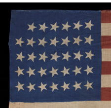 34 STARS, CIVIL WAR PERIOD, PRINTED ON A WOOL BLENDED FABRIC, RARE NOTCHED DESIGN WITH TILTED STARS, POSSIBLY A UNION ARMY CAMP COLORS