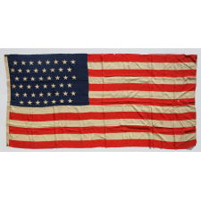 47 STARS ON AN ANTIQUE AMERICAN FLAG MADE TO REFLECT NEW MEXICO STATEHOOD, AN EXTREMELY SCARCE EXAMPLE, NEVER AN UNOFFICIAL STAR COUNT, CA 1912