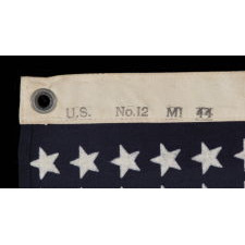 48 STAR, U.S. NAVY SMALL BOAT ENSIGN, MADE AT MARE ISLAND, CALIFORNIA DURING WWII, SIGNED AND DATED 1944, IN THE SMALLEST SCALE EMPLOYED AT THE TIME