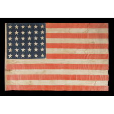 36 STAR ANTIQUE AMERICAN PARADE FLAG OF THE CIVIL WAR ERA, IN AN ESPECIALLY LARGE SCALE AND WITH BOLD COLOR, 1864-67, NEVADA STATEHOOD
