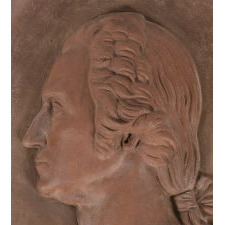 SUBSTANTIAL AND BEAUTIFUL TERRACOTTA BUST OF GEORGE WASHINGTON IN A WALL-HANGING PLAQUE, MADE IN NEW YORK, SIGNED & DATED 1887