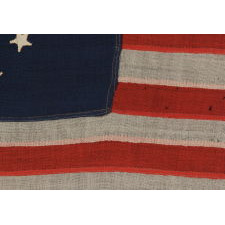 13 STARS IN THE 3rd MARYLAND PATTERN ON A CIVIL WAR ERA FLAG WITH THE SMALLEST HAND-APPLIQUÉD STARS THAT I HAVE EVER SEEN ON A WOOL EXAMPLE OF THE 19TH CENTURY
