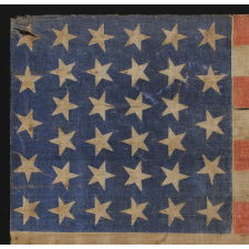 34 STARS WITH SCATTERED ORIENTATION ON A RARE, LARGE SCALE, CIVIL WAR PERIOD PARADE FLAG WITH ENDEARING WEAR FROM OBVIOUS EXTENDED USE, KANSAS STATEHOOD, 1861-63