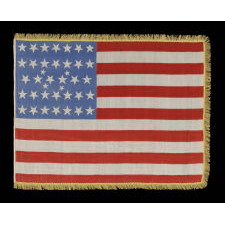 38 STARS IN AN EXTREMELY RARE LINEAL CONFIGURATION THAT HAS 4 TINY STARS EMBEDDED IN THE PATTERN, FORMERLY IN THE COLLECTION OF RICHARD PIERCE AND PICTURED IN HIS TEXT ON FLAG COLLECTING