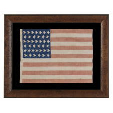 39 TILTED STARS ON AN ANTIQUE AMERICAN FLAG WITH A ROYAL BLUE CANTON, NEVER AN OFFICIAL STAR COUNT, 1876-1889