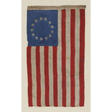 13 HAND-EMBROIDERED STARS AND EXPERTLY HAND-SEWN STRIPES, ON A FLAG MADE BY SARAH M. WILSON, GREAT-GRANDDAUGHTER OF BETSY ROSS, IN PHILADELPHIA IN 1904