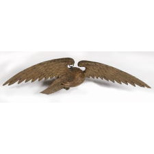 CARVED AMERICAN EAGLE IN FLIGHT WITH EXCEPTIONAL FORM, CRAFTSMANSHIP, & SCALE, EXTREMELY UNUSUAL AS A TRULY FULL-BODIED SCULPTURE, CARVED IN THE ROUND, circa 1810-1830
