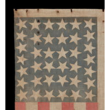 38 LARGE STARS POINTING IN VARIOUS DIRECTIONS ON AN ANTIQUE AMERICAN PARADE FLAG WITH PERSIMMON STRIPES, AN ABSOLUTELY BEAUTIFUL EXAMPLE IN A VARIATION THAT I HAVE NOT BEFORE SEEN, COLORADO STATEHOOD, 1876-1889