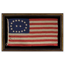 17 STARS IN AN OVAL MEDALLION WITH 2 STARS IN THE CENTER, A MID-19TH CENTURY FLAG WITH A RARE STAR COUNT, IN AN EXTRAORDINARY CONFIGURATION, AND IN A DESIRABLE SMALL SCALE AMONG ITS COUNTERPARTS OF THE PERIOD; MADE CA 1850-1865, LIKELY TO COMMEMORATE OHIO AS THE 17TH STATE