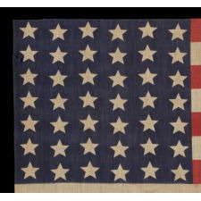 42 STARS IN A WAVE CONFIGURATION ON AN ANTIQUE AMERICAN FLAG, NEVER AN OFFICIAL STAR COUNT, 1889-1890, WASHINGTON STATEHOOD