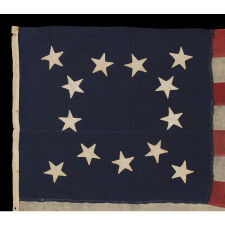 AN EXCEPTIONAL, PRE-CIVIL WAR, 13 STAR FLAG WITH A BEAUTIFUL MEDALLION CONFIGURATION OF STARS THAT IS UNIQUE AMONG ITS KNOWN EARLY COUNTERPARTS, 1830-1850
