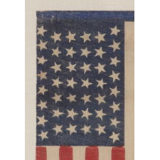 44 TUMBLING STARS IN AN HOURGLASS FORMATION, ON AN ANTIQUE AMERICAN PARADE FLAG OF THE 1890-1896 PERIOD,, REFLECTS WYOMING STATEHOOD