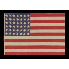 42 STARS, AN UNOFFICIAL STAR COUNT, ON AN ANTIQUE AMERICAN FLAG WITH SCATTERED STAR POSITIONING, 1889-1890, WASHINGTON STATEHOOD