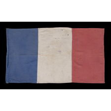 REMARKABLE FRENCH FLAG WITH AMERICAN SALUTATIONS, WAVED AND SIGNED BY MEMBERS OF THE HENRY FAMILY IN THANKFUL CELEBRATION OF THEIR LIBERATION FROM THE NAZIS DURING WWII, 1944-45