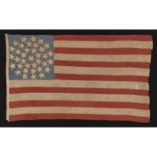 36 STARS ARRANGED IN A RARE "SNOWBALL MEDALLION," ON AN ENTIRELY HAND-SEWN FLAG OF THE CIVIL WAR ERA, WITH GREAT WEAR FROM EXTENDED USE AND IN A GREAT SMALL SIZE FOR THE PERIOD, 1864-1867, NEVADA STATEHOOD