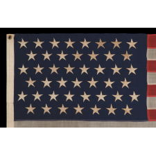 45 STARS ON AN ANTIQUE AMERICAN FLAG WITH ELONGATED PROPORTIONS AND IN A SMALL SCALE FLAG OF THE PERIOD AMONG THOSE WITH PIECED-AND-SEWN CONSTRUCTION, 1896-1908, SPANISH-AMERICAN WAR ERA, UTAH STATEHOOD