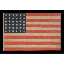 36 STAR ANTIQUE AMERICAN PARADE FLAG OF THE CIVIL WAR ERA, IN AN ESPECIALLY LARGE SCALE AND WITH BOLD COLOR, 1864-67, NEVADA STATEHOOD