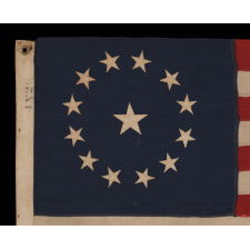 13 STARS IN A CIRCULAR VERSION OF THE 3RD MARYLAND PATTERN, ON AN ESPECIALLY ATTRACTIVE, SMALL SCALE, ANTIQUE AMERICAN FLAG, MADE IN THE 1890-1910 ERA