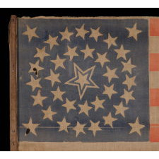 35 STARS IN A MEDALLION CONFIGURATION WITH A LARGE, HALOED CENTER STAR, ON ITS ORIGINAL WOODEN STAFF, CIVIL WAR PERIOD, WEST VIRGINIA STATEHOOD, 1863-65
