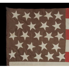 23 STARS ON AN ANTIQUE AMERICAN FLAG MADE IN THE PERIOD BETWEEN 1870 AND THE 1890'S; AN EXTREMELY RARE STAR COUNT, PROBABLY MADE TO COMMEMORATE THE YEAR IN WHICH MAINE ENTERED THE UNION AS THE 23rd STATE, IN 1820 
