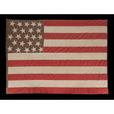 23 STARS ON AN ANTIQUE AMERICAN FLAG MADE IN THE PERIOD BETWEEN 1870 AND THE 1890'S; AN EXTREMELY RARE STAR COUNT, PROBABLY MADE TO COMMEMORATE THE YEAR IN WHICH MAINE ENTERED THE UNION AS THE 23rd STATE, IN 1820