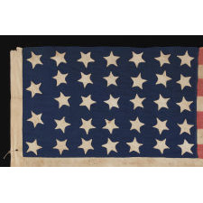 34 STARS, AN ENTIRELY HAND-SEWN CIVIL WAR PERIOD FLAG IN AN EXTRAORDINARY SMALL SIZE FOR THE PERIOD, 1861-63, KANSAS STATEHOOD