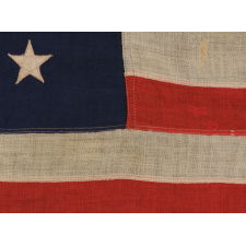 ANTIQUE AMERICAN PRIVATE YACHT FLAG (ENSIGN) WITH 13 STARS, MARKED "U.S. ARMY STANDARD BUNTING", 1895-1910 ERA