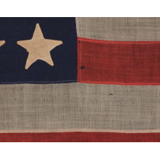 35 HAND-SEWN, SINGLE-APPLIQUÉD STARS ON A CIVIL WAR FLAG FLOWN BY A NEW YORK STATE TINSMITH, MADE BETWEEN 1863 - 1865, REFELECTS WEST VIRGINIA STATEHOOD