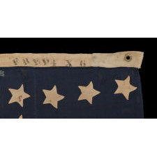 37 SINGLE APPLIQUÉD STARS ON AN ANTIQUE AMERICAN FLAG MADE DURING THE RECONSTRUCTION ERA, DURING THE INDIAN WARS, BETWEEN 1867-1876, WHEN NEBRASKA WAS THE MOST RECENT STATE TO JOIN THE UNION