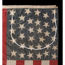 33 STAR ANTIQUE AMERICAN FLAG WITH 11 STRIPES, HAPHAZARD STAR PLACEMENT, AND ITS CANTON RESTING ON THE WAR STRIPE; MADE IN THE PERIOD BETWEEN 1859-1861, OREGON STATEHOOD, PRE-CIVIL WAR THROUGH THE WAR'S OPENING YEAR