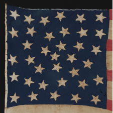 36 STARS, A HOMEMADE FLAG OF THE CIVIL WAR ERA WITH AN EXCEPTIONAL RANDOM STAR PATTERN AND GREAT DISPARITY BETWEEN THE WIDTH OF THE RED AND WHITE STRIPES, NEVADA STATEHOOD, 1864-67