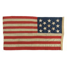 13 STARS ON A U.S. NAVY SMALL BOAT ENSIGN, ENTIRELY HAND-SEWN, PROBABLY MADE BETWEEN 1882 AND 1884, A BEAUTIFUL EXAMPLE IN A REMARKABLE STATE OF PRESERVATION
