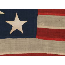 13 STARS ON A U.S. NAVY SMALL BOAT ENSIGN, ENTIRELY HAND-SEWN, PROBABLY MADE BETWEEN 1882 AND 1884, A BEAUTIFUL EXAMPLE IN A REMARKABLE STATE OF PRESERVATION