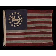 13 STAR PRIVATE YACHT ENSIGN, THE SMALLEST EXAMPLE THAT I HAVE EVER ENCOUNTERED WITH HAND-SEWN STARS AND A CANTED ANCHOR, 1885-1895