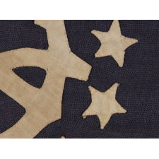 13 STAR PRIVATE YACHT ENSIGN, THE SMALLEST EXAMPLE THAT I HAVE EVER ENCOUNTERED WITH HAND-SEWN STARS AND A CANTED ANCHOR, 1885-1895